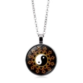 Detailed view of Yin Yang Tai Chi glass pendant with orange flame aura on silver chain - Fire Sun Tai Chi Style (XSWX4415-12) / Silver