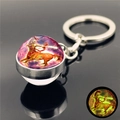 Luminous Sagittarius keychain with glowing glass ball and silver metal ring accessory - Sagittarius