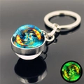 Glow in the dark Pisces zodiac keychain with crystal glass ball on a silver metal ring - Pisces