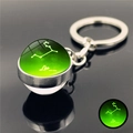 Luminous Leo zodiac keychain with green glow crystal glass ball on silver ring - Leo