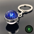 Portachiavi zodiaco Gemelli luminoso con base in metallo argento e sfera di vetro - Gemelli