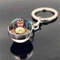 Silver zodiac keychain with a double-sided Virgo glass ball and stellar pattern - Virgo