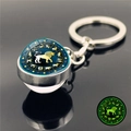 Porte-clés signe Lion lumineux avec boule de cristal phosphorescente et anneau métal - Lion