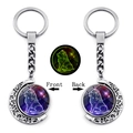 Portachiavi luminoso zodiaco Leone con luna crescente in metallo argento e design stellato - Leone (XSWX4670-4)