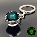 Porte-clés Taureau lumineux avec boule en verre et effet fluorescent nocturne - Taureau