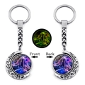 Detailed view of luminous crescent moon keychain with purple nebula fairy glass dome charm - Gemini (XSWX4670-9)