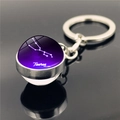 Silver Taurus zodiac keychain with purple galaxy crystal ball and date 04.21-05.21 - Taurus