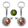 Glow in the dark Taurus zodiac sign keychain with rotating moon pendant and silver finish - Taurus Style (XSWX4663-11)