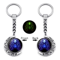 Luminous Virgo constellation keychain featuring double-sided rotating moon pendant - Virgo