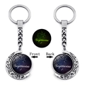 Detailed view of Sagittarius luminous keychain with rotating moon pendant and glow feature - Sagittarius (XSWX4669-9)