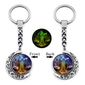 Luminous Libra constellation keychain featuring a silver moon swivel design - Libra (XSWX4670-5)