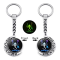 Luminous Scorpio zodiac keychain with rotating double-sided moon pendant in silver metal - Scorpio