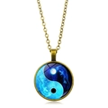 Vintage bronze necklace with blue Yin Yang glass pendant featuring intricate dragon patterns - Bronze Border Dragon Pattern Tai Chi (XSWX4416-1)