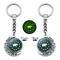 Detailed view of rotating Taurus zodiac keychain with luminous moon pendant - Taurus (XSWX4673-12-Taurus)
