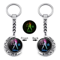 Luminous Libra zodiac keychain with spinning moon frame and double-sided glass pendant - Libra