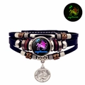 Détail du bracelet en cuir Sagittaire avec dôme en verre lumineux et pendentif en métal - Sagittaire