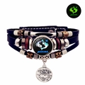 Détails macro du bracelet multicouche en cuir signe Poissons avec perles en métal - Poissons