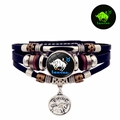 Vue détaillée du bracelet Taureau en cuir multicouche avec perles et breloque lumineuse - Taureau