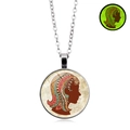 Luminous round glass necklace with a colorful bohemian silhouette pattern - Virgo