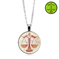 Vintage silver Libra zodiac necklace with glowing glass pendant and intricate chain - Libra