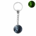 Luminous howling wolf keychain detail showing green glow in the dark effect on metal ring - Xswx4773-15