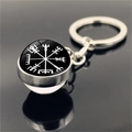 Macro side view of silver metal Viking Vegvisir compass keychain with glass dome pendant - Black White Contrast Rune Style (XSWX4422-11)