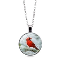 Detailed view of cardinal bird glass cabochon pendant with silver metal chain - Cardinal and Pine Landscape (XSWX5042-6)