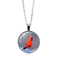 Red Cardinal glass cabochon pendant necklace with a silver link chain on white background - Cardinal on Green Stone (XSWX5042-7)