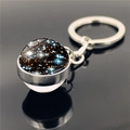 Doppelseitiger Galaxie-Nebel-Glasball-Schlüsselanhänger mit silbernem Ring und Kosmos-Muster - Brillantes Galaxiemuster (XSWX3423-2)