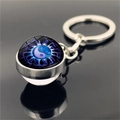 Detailed macro of the blue-purple Yin Yang glass pendant with polished metal ring - Blue Purple Yin Yang(XSWX4433-10)