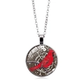 Silver chain necklace with a round glass pendant featuring a red cardinal on a branch - Cardinal on Dark Background (XSWX5042-11)