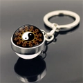 Yin Yang Tai Chi keychain with orange flame patterns and a double-sided crystal glass ball - Xswx4433-12