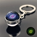 Glow-in-the-dark galaxy keychain with purple nebula glass ball and silver metal ring - Nebula