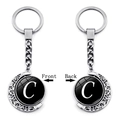 Porte-clés lune rotatif en argent avec pendentif lettre C double face sur fond gris - Style Initiale C (XSWX5286-C)