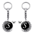 Rotating moon keychain with double-sided letter S on black disk in silver finish - Initial S Style (XSWX5286-S)