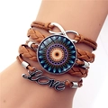 Brown multilayer leather infinity love bracelet with mandala glass charm on model wrist - Brown Vintage Mandala Style (XSWX5392-6)