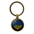 Vintage bronze keychain with glass dome featuring blue and yellow butterfly heart art - Butterfly Heart Cluster (XSWX5352-5) / Antique Bronze