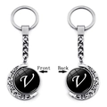 Rotating silver moon keychain featuring double-sided letter V charm in elegant font - Initial V Style (XSWX5286-V)