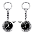 Rotating silver moon keychain featuring double-sided time gem with letter X pendant - Initial X Style (XSWX5286-X)