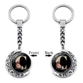 Detailed front and back view of silver moon-shaped rotating keychain with letter C - Initial C Floral Style (XSWX5492-C)