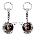 Close-up of double-sided rotating moon keychain with letter F and floral pattern - Initial F Floral Style (XSWX5492-F)