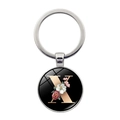 Silver metal keychain with letter X and floral pattern on a black round pendant - Letter X (XSWX5495-X)