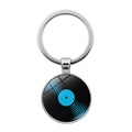 Detailed close-up of retro vinyl record keychain with glass dome and silver metal ring - Silver Style 7
