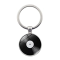 Close-up of a vintage vinyl record charm keychain with a polished silver metal ring - Silver Style 8