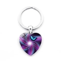 Blue butterfly heart-shaped pendant keychain with a colorful nebula art glass dome - Single Blue Butterfly Spiral Nebula Background Silver Frame (XSWX5582-4)