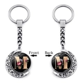 Rotating moon keychain with letter M and floral pattern front and back views - Initial M Floral Style (XSWX5492-M)