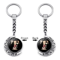 Rotating moon keychain with letter T and pink floral design on a silver metal ring - Initial T Floral Style (XSWX5492-T)