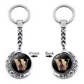 Rotating moon keychain featuring a floral letter W design with front and back views - Initial W Floral Style (XSWX5492-W)