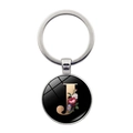 Silver metal keychain featuring a round glass pendant with floral art letter J - Letter J (XSWX5495-J)