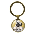 Close-up of pug illustration in bronze time gem glass pendant keychain - Pug in Bowl Illustration (XSWX5758-5 Antique Bronze)